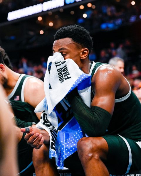 MSU graduate guard Tyson Walker sits on the bench in the final moments of a 69-85 loss to North Carolina in the second round of the NCAA Tournament on Saturday, Mar. 23, 2024 at the Spectrum Center in Charlotte, NC.