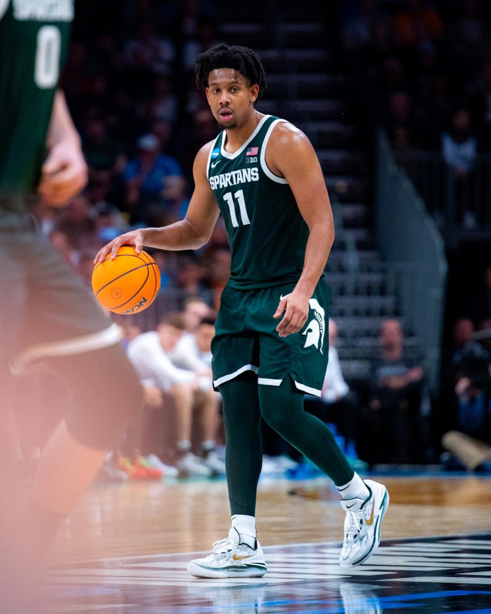 MSU senior guard A.J. Hoggard dribbles the ball during a 69-85 loss to North Carolina in the second round of the NCAA Tournament on Saturday, Mar. 23, 2024 at the Spectrum Center in Charlotte, NC.