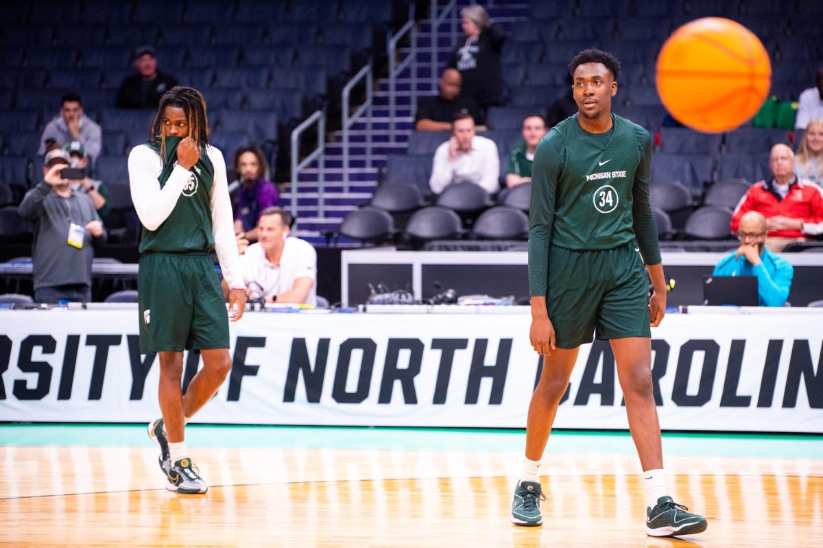 MSU+freshman+forwards+Coen+Carr+%28left%29+and+Xavier+Booker+%28right%29+participate+in+the+Spartans+open+practice+on+Wednesday%2C+Mar.+20%2C+2024+at+the+Spectrum+Center+in+Charlotte%2C+NC.+