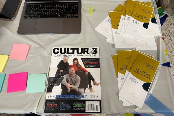 Photo of promotional materials like magazines and pamphlets on a table. 