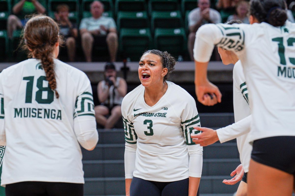 Outside hitter Akasha Anderson celebrates after securing another kill in MSU's matchup versus Purdue Fort Wayne. (Sept. 17, 2024)