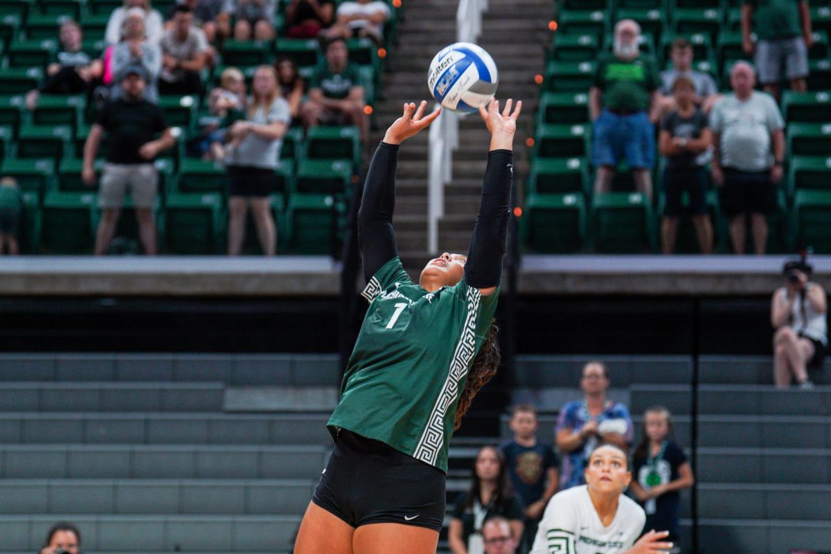 MSU graduate libero Nalani Iosia sets her outside hitters during the Spartans matchup versus Purdue Fort Wayne. (Sept. 17, 2024)