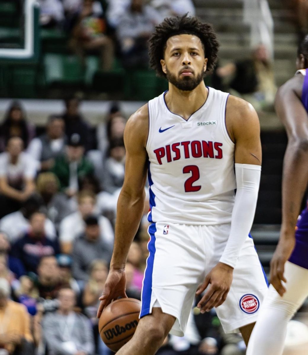 Pistons guard Cade Cunningham works the offense in Pistons-Suns preseason game hosted at the Breslin Center (Oct. 8, 2024).