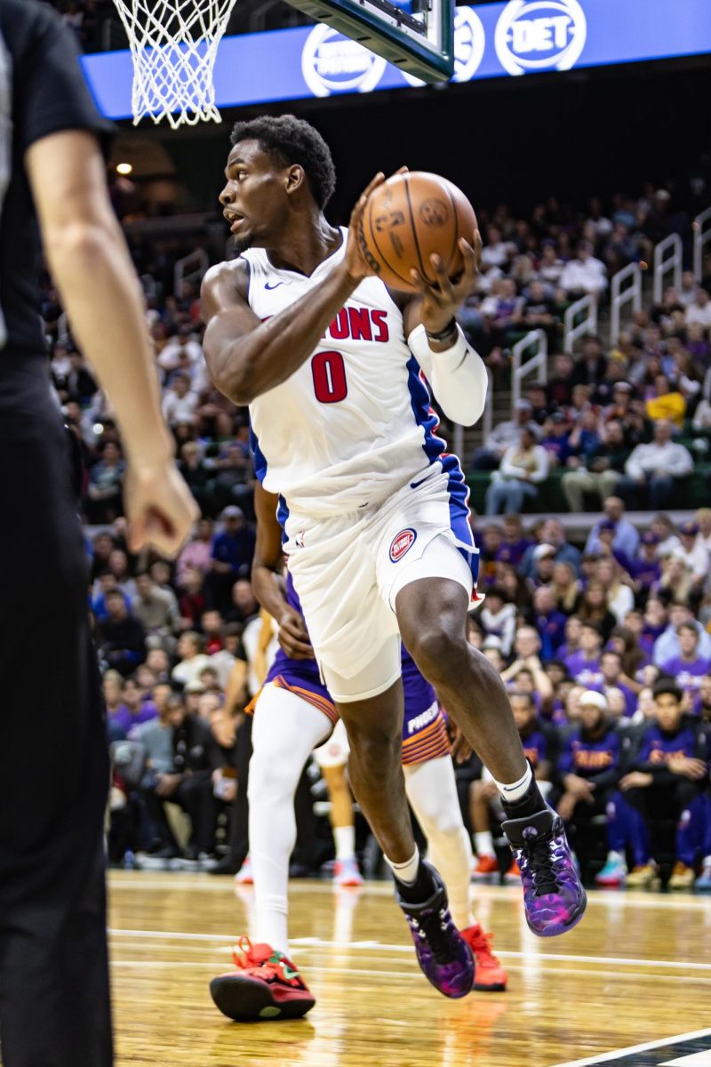 Jalen Duren works the baseline at the Breslin Center for the Detroit Pistons versus Phoenix Suns preseason matchup (Oct. 8, 2024).