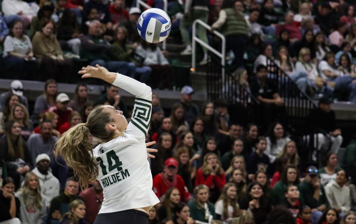 MSU OH Taylah Holdem serves versus No. 2 Nebraska (East Lansing, Oct. 18, 2024).