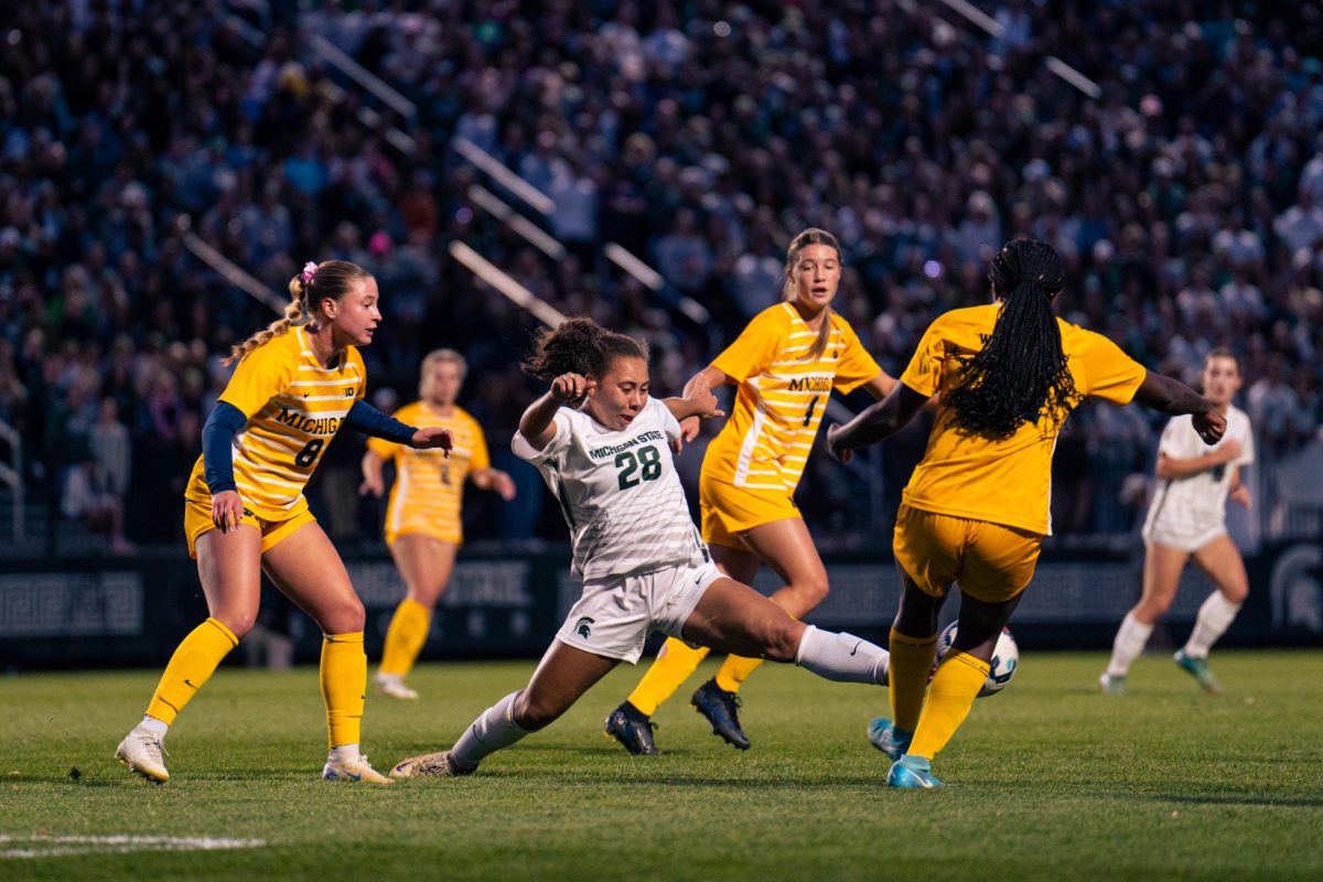 MSU's Renee Watson fights for the ball against Michigan (Oct. 5, 2024).