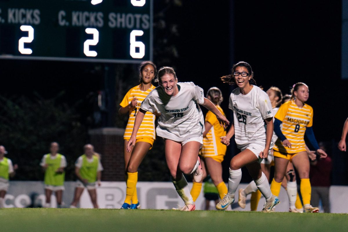 MSU graduate midfielder celebrates after sending the ball into the back of the net on a penalty kick for a goal against the Michigan Wolverines. (Oct. 5, 2024)