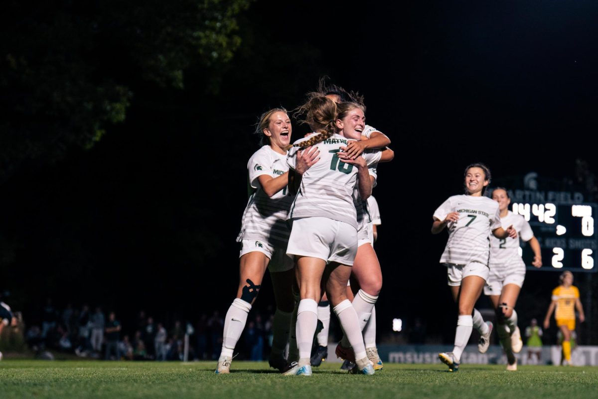 Midfielder Justina Gaynor celebrating with her teammates after a goal against the Michigan Wolverines. (Oct. 5, 2024)