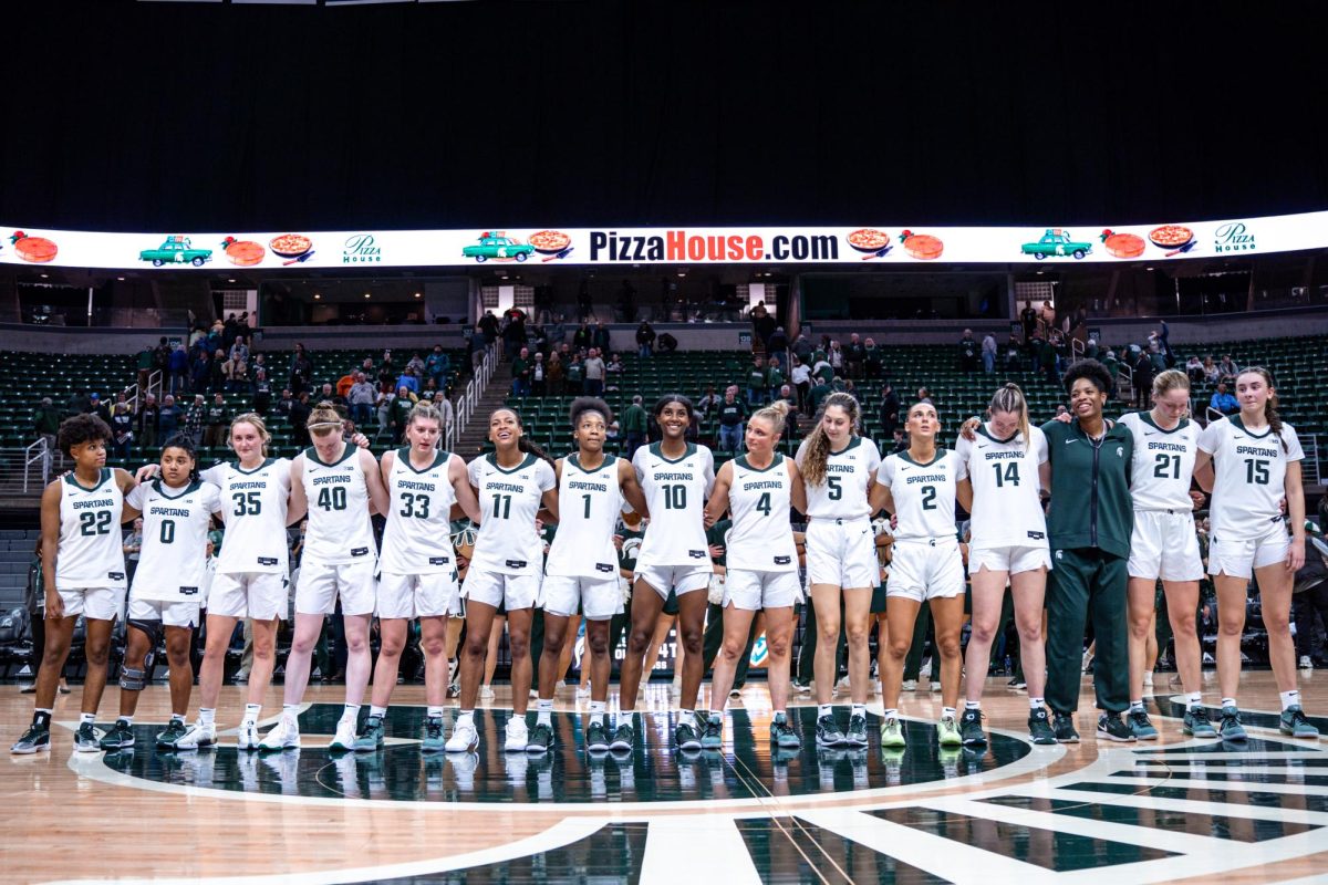 MSU women's basketball takes team photo after exhibition victory against Wayne State (East Lansing, Oct. 28 2024)