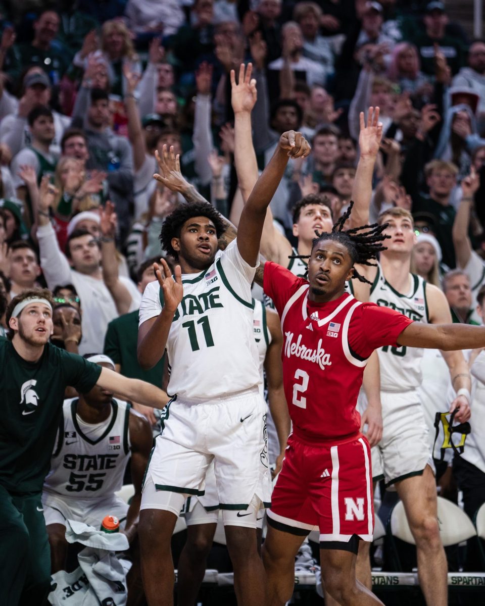 Jase Richardson fires a three-pointer in MSU's dominant victory over Nebraska (East Lansing, Dec. 7, 2024). 