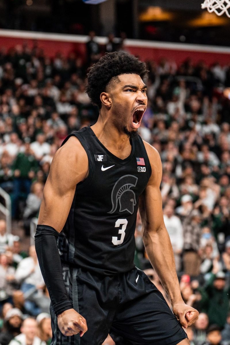 Senior guard Jaden Akins expressive after massive slam dunk at Little Caesars Arena. Akins had 16-points in MSUs dominant win over Oakland (Detroit, Dec. 17 2024).