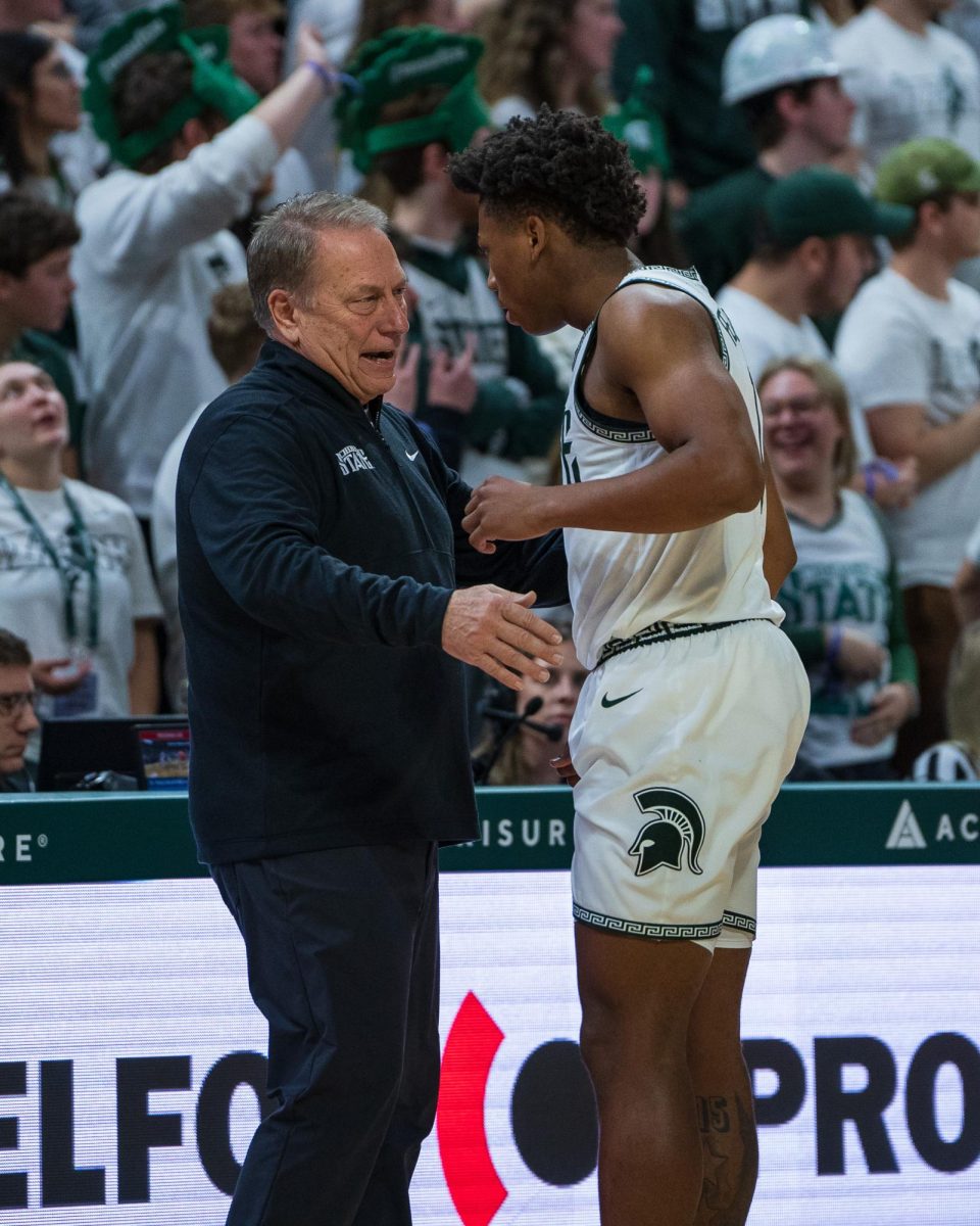 MSU men's basketball head coach Tom Izzo discusses gameplan with redshirt freshman guard Jeremy Fears Jr. (East Lansing, Jan. 19 2025).