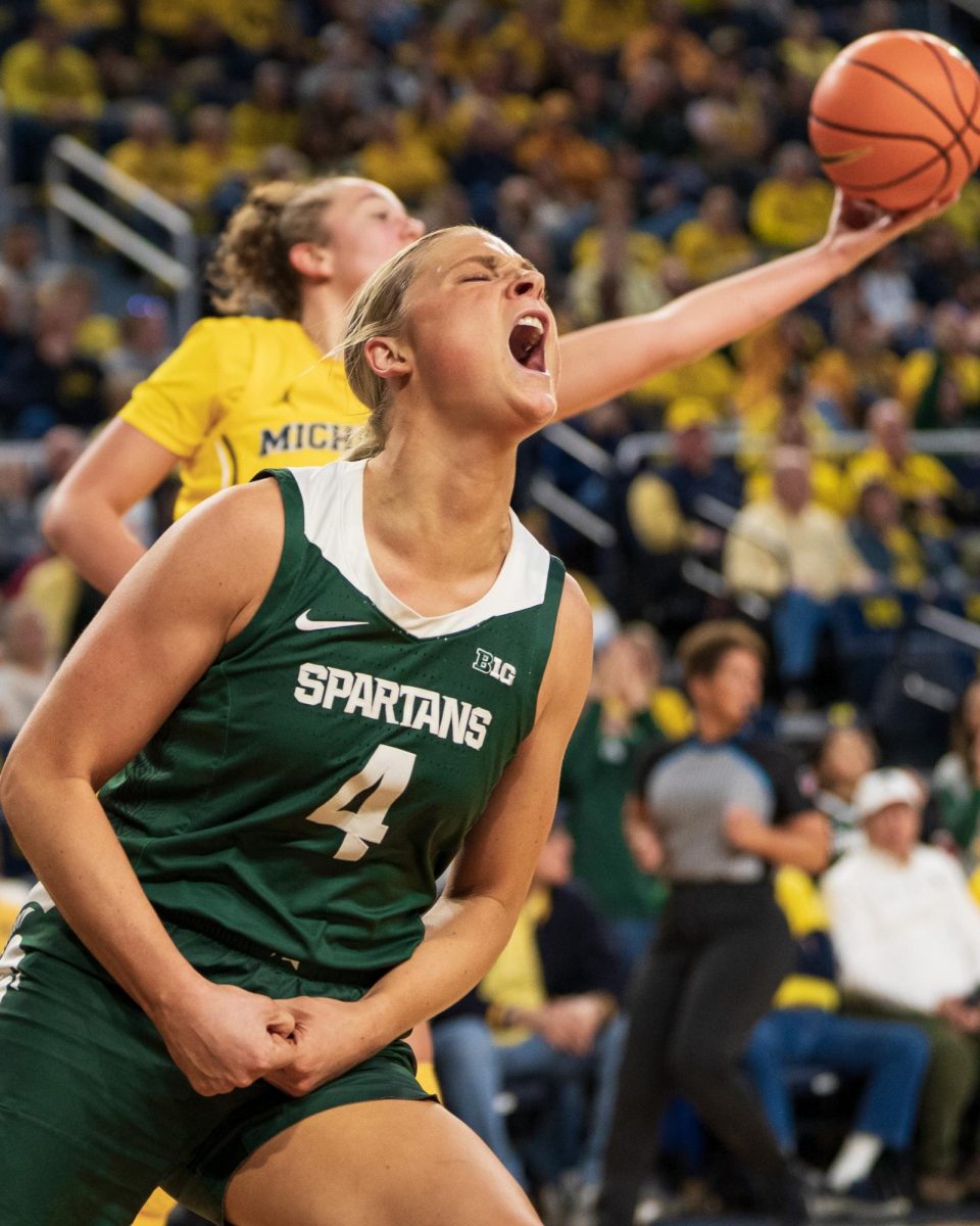 Junior guard Theryn Hallock celebrates after a big steal-and-score bucket vs No. 24 Michigan (Ann Arbor, Jan. 25 2025).