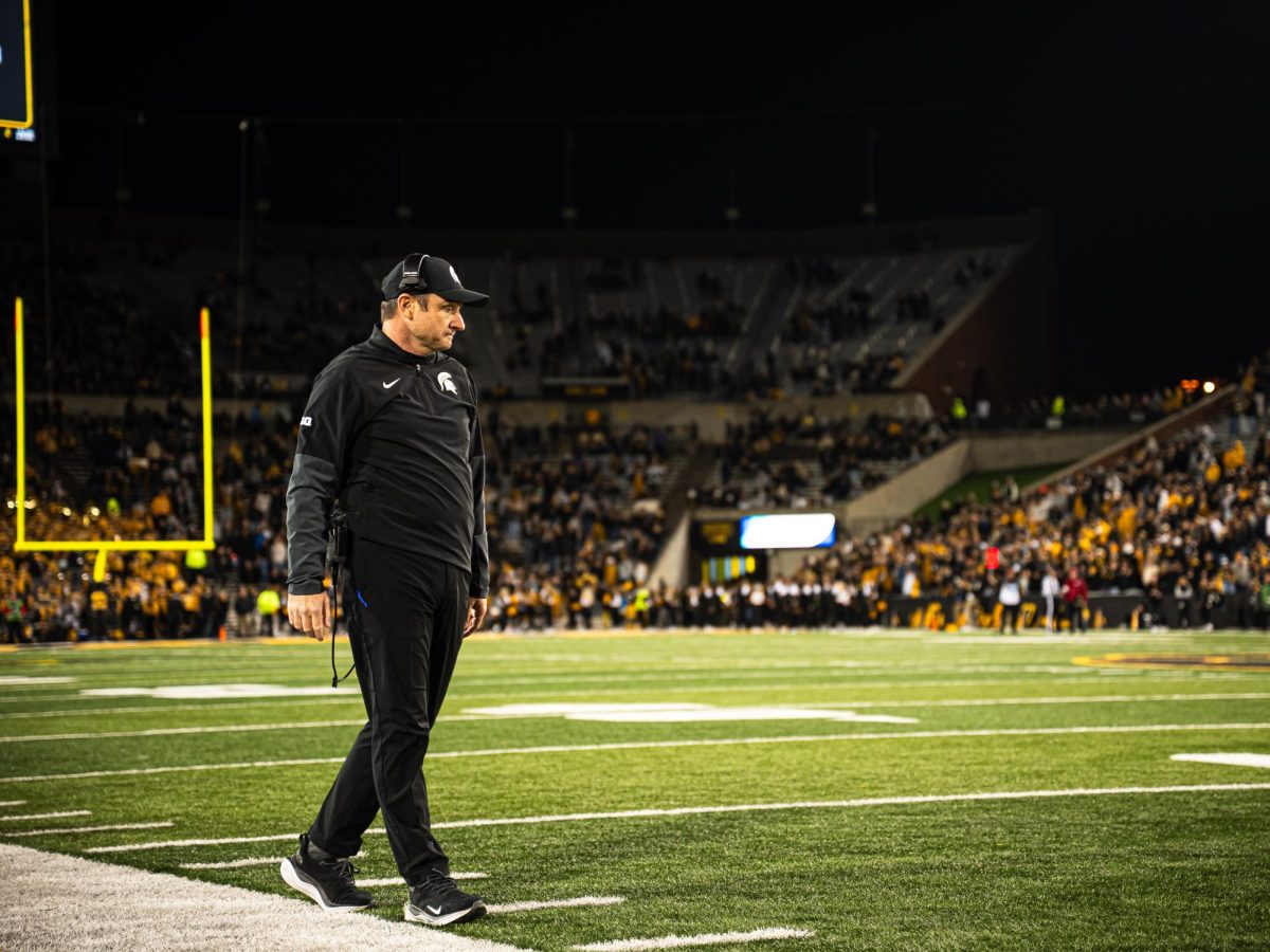 Michigan State football head coach Jonathan Smith watches from the sidelines during the Spartans contest against Iowa (Nov. 22, 2025)