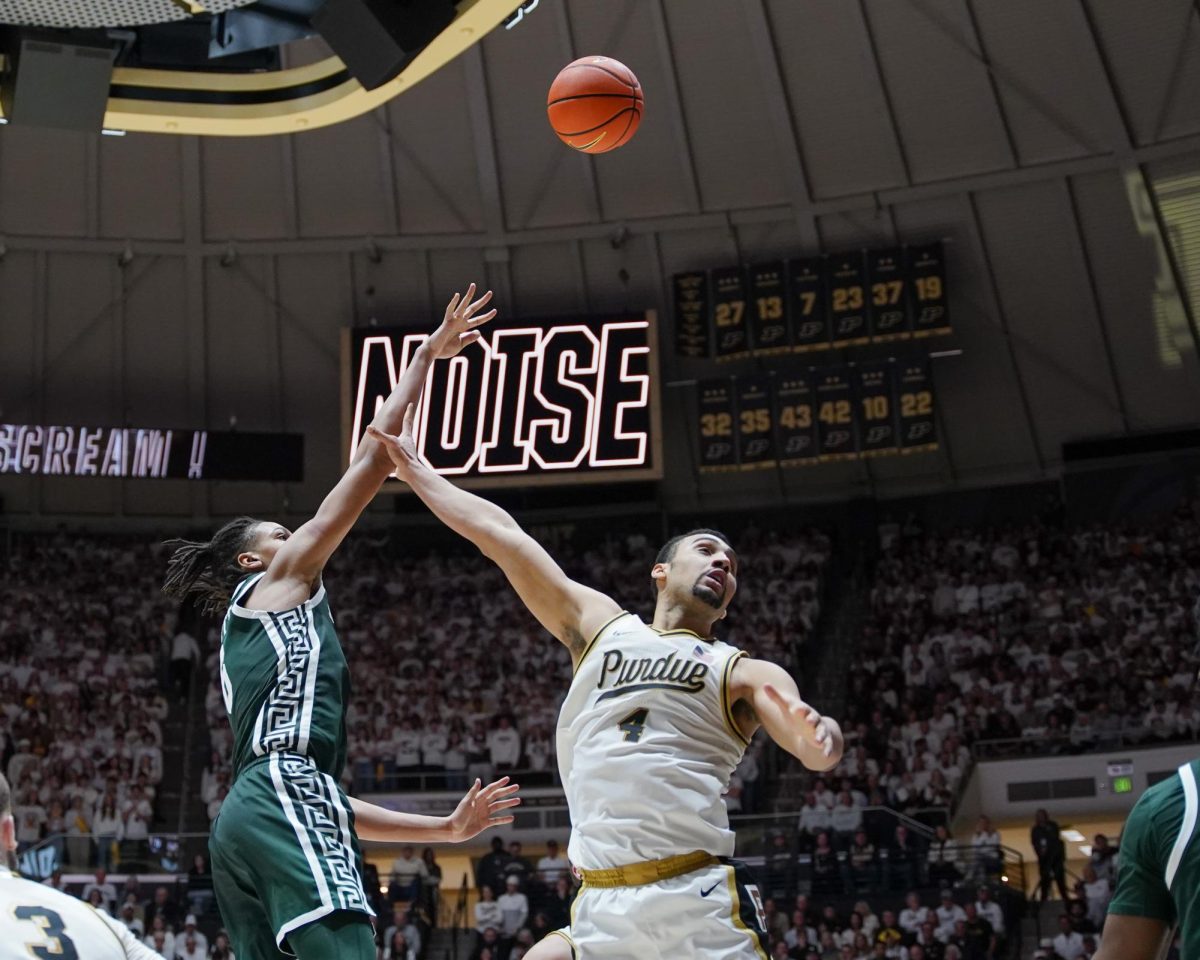 Michigan State's Jordan Scott(6) shoots over Purdue Boilermaker Trey Kaufman-Renn(4) in West Lafayette, Thursday, Feb. 26th, 2026.