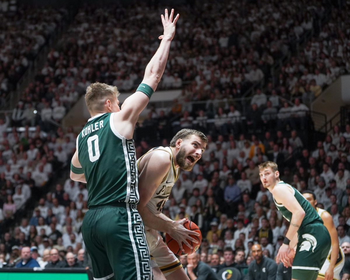 Michigan State's Jaxon Kohler(0) guards Purdue Boilermaker Oscar Cluff(45) in West Lafayette, Thursday, Feb. 26th, 2026.
