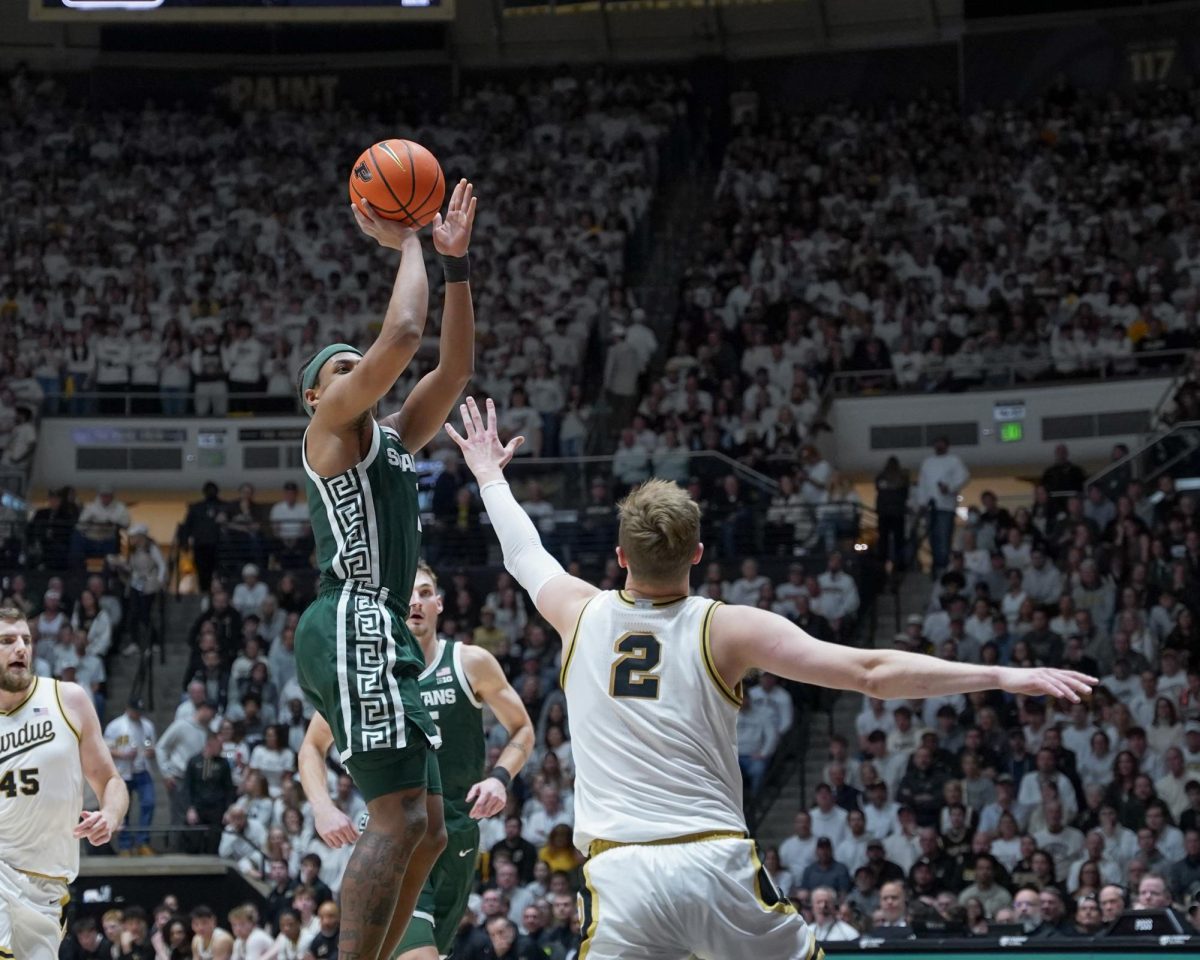 Michigan State's Jeremy Fears(1) shoots over Purdue Boilermaker Fletcher Loyer(2) in West Lafayette, Thursday, Feb. 26th, 2026.