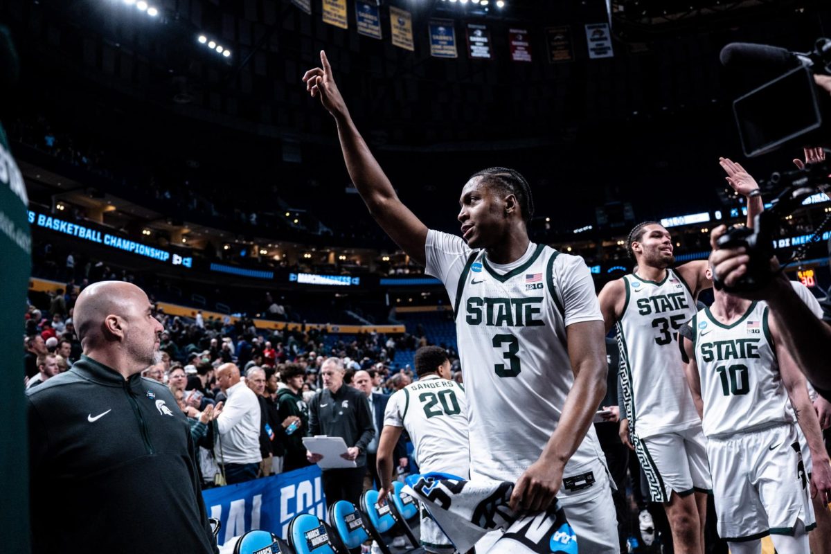 Michigan State forward Cam Ward (3) points the crowd at the Key Bank Center after the win over North Dakota State (Buffalo, N.Y., March 19, 2026)